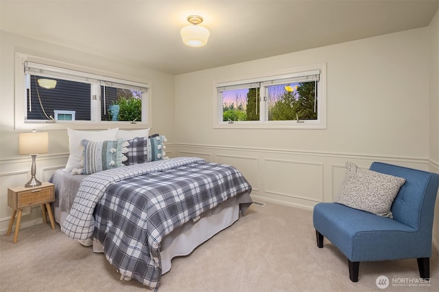 2249 78th Ave SE, Mercer Island, WA 98040 - carpeted bedroom featuring a decorative wall and wainscoting