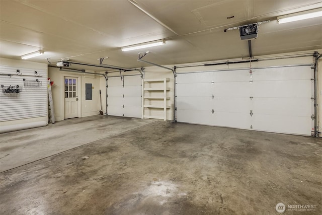 2249 78th Ave SE, Mercer Island, WA 98040 - garage featuring a garage door opener and electric panel