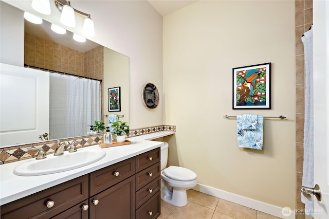 400 Washington Ave Unit 415, Bremerton, WA 98337 - bathroom featuring tile patterned flooring, vanity, toilet, baseboards, and curtained shower