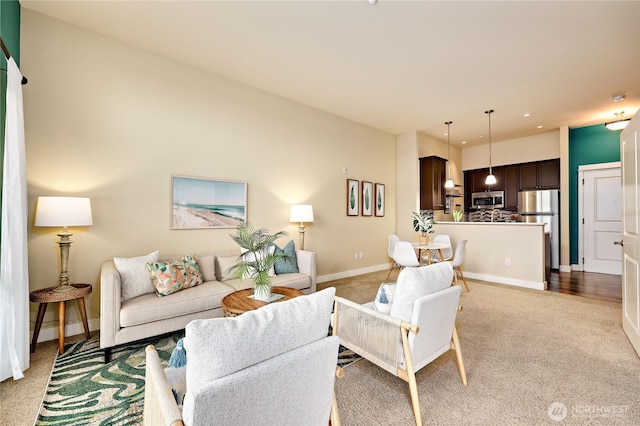 400 Washington Ave Unit 415, Bremerton, WA 98337 - living room featuring baseboards, light colored carpet, and recessed lighting