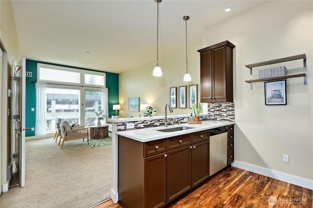 400 Washington Ave Unit 415, Bremerton, WA 98337 - kitchen with a sink, stainless steel dishwasher, a peninsula, dark brown cabinetry, and light countertops
