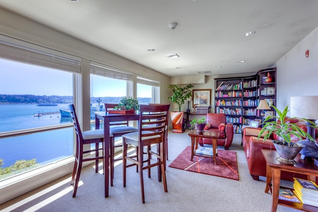 400 Washington Ave Unit 415, Bremerton, WA 98337 - dining area with carpet floors, a water view, and recessed lighting