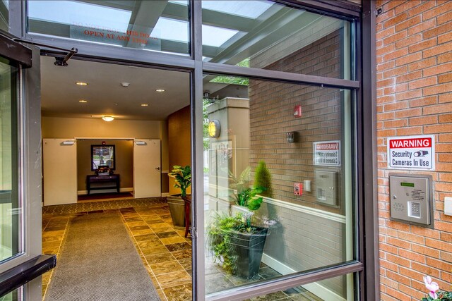 400 Washington Ave Unit 415, Bremerton, WA 98337 - doorway to property featuring brick siding