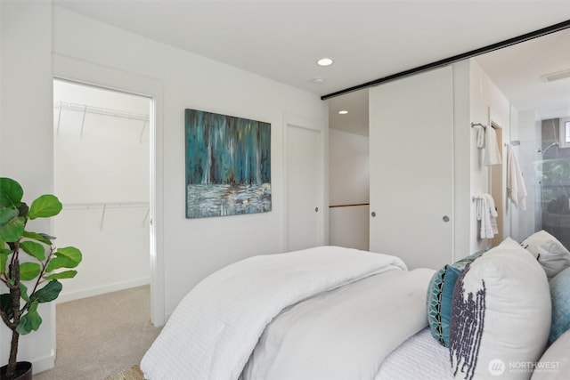 carpeted bedroom with recessed lighting and baseboards