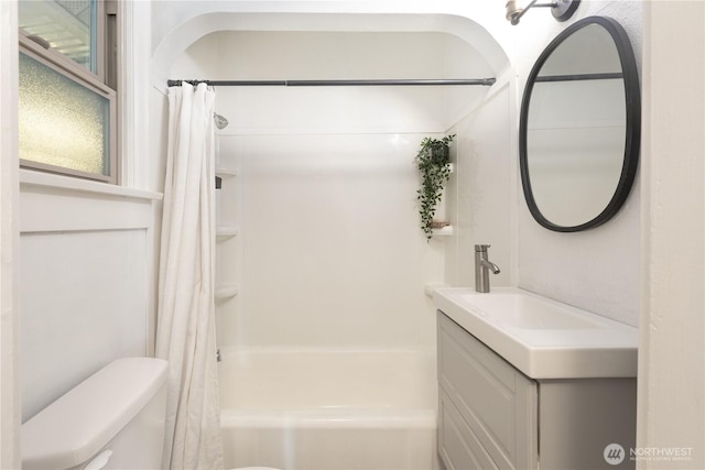 2010 13th Ave NW, Puyallup, WA 98371 - bathroom featuring toilet, shower / bathtub combination with curtain, and vanity