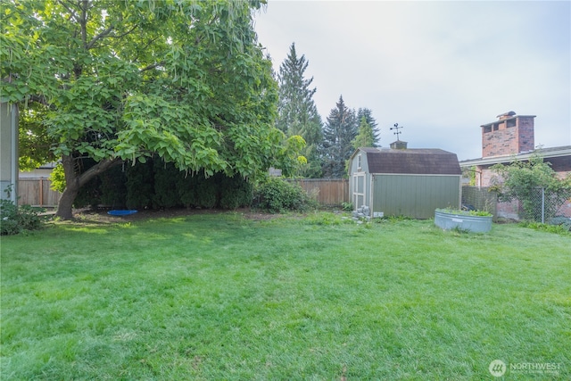 2010 13th Ave NW, Puyallup, WA 98371 - view of yard featuring a storage unit and an outdoor structure