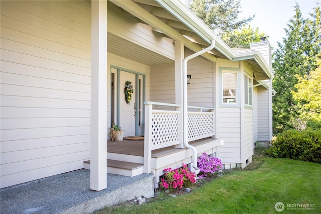 2016 Creekside Ln, Anacortes, WA 98221 - property entrance featuring a chimney, a porch, and a lawn