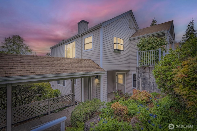 4105 Providence Point Dr SE, Issaquah, WA 98029 - view of front of property with a chimney and a shingled roof