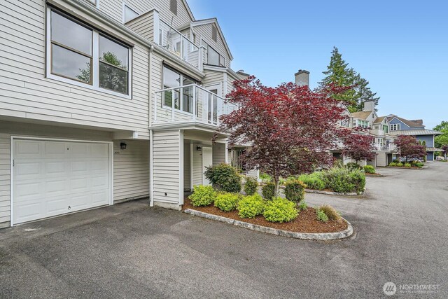 4105 Providence Point Dr SE, Issaquah, WA 98029 - view of home's exterior featuring an attached garage and a residential view