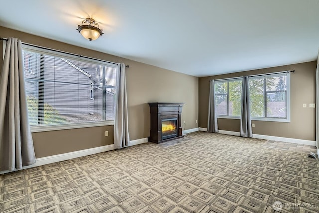 4105 Providence Point Dr SE, Issaquah, WA 98029 - unfurnished living room with a glass covered fireplace and baseboards