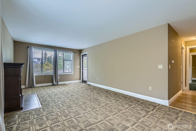 4105 Providence Point Dr SE, Issaquah, WA 98029 - unfurnished living room featuring baseboards