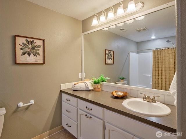 13708 401st Way, Amboy, WA 98601 - bathroom featuring vanity, curtained shower, toilet, baseboards, and tile patterned flooring