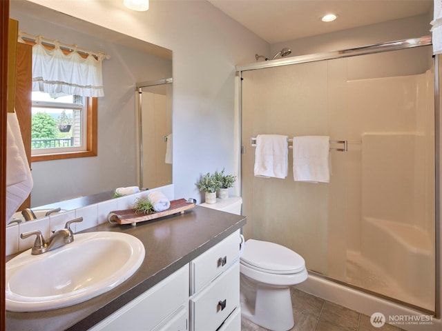13708 401st Way, Amboy, WA 98601 - full bath featuring tile patterned flooring, a shower stall, vanity, toilet, and recessed lighting