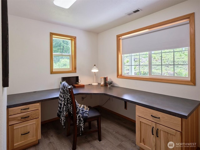 13708 401st Way, Amboy, WA 98601 - home office with built in study area, wood finished floors, healthy amount of natural light, and baseboards