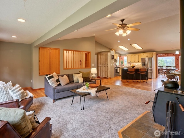 13708 401st Way, Amboy, WA 98601 - living room with lofted ceiling, ceiling fan, light wood-type flooring, recessed lighting, and baseboards