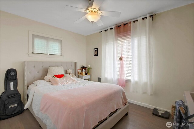 6928 S Cheyenne St, Tacoma, WA 98409 - bedroom featuring wood finished floors, baseboards, and a ceiling fan