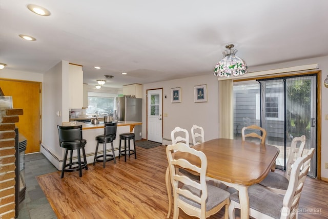 3822 Shelby Rd, Lynnwood, WA 98087 - dining area featuring light wood finished floors and recessed lighting