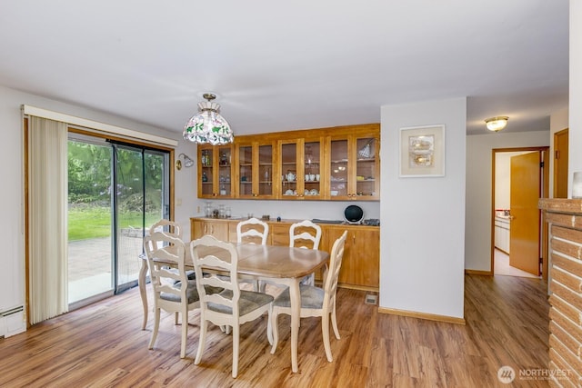 3822 Shelby Rd, Lynnwood, WA 98087 - dining area with light wood finished floors and baseboards