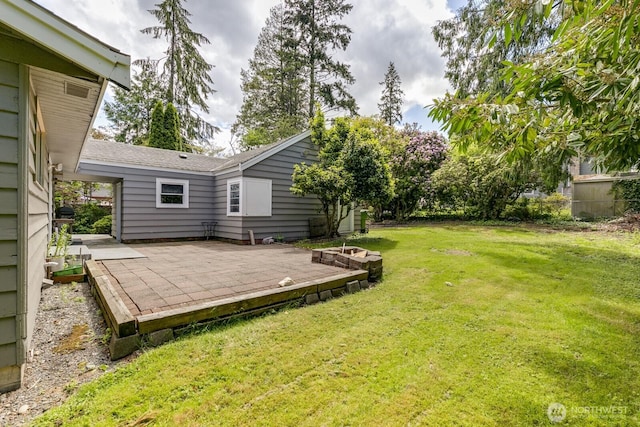 3822 Shelby Rd, Lynnwood, WA 98087 - view of green lawn featuring a patio