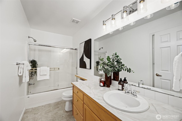 4133 156th St SW Unit 7, Lynnwood, WA 98087 - bathroom featuring vanity, toilet, and enclosed tub / shower combo
