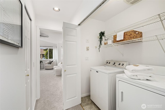 4133 156th St SW Unit 7, Lynnwood, WA 98087 - washroom featuring washing machine and clothes dryer, recessed lighting, baseboards, and light carpet