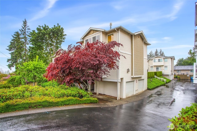 4133 156th St SW Unit 7, Lynnwood, WA 98087 - view of property exterior featuring an attached garage