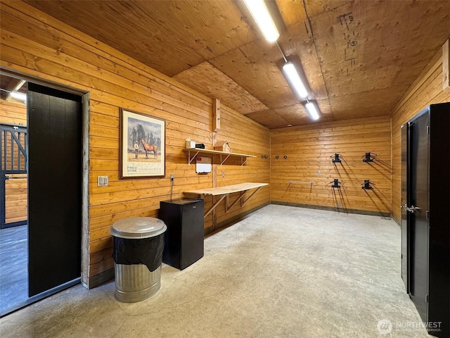 921 Chicken Coop Rd, Sequim, WA 98382 - interior space featuring concrete floors and wood walls