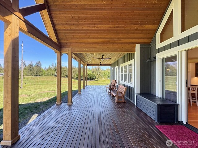 921 Chicken Coop Rd, Sequim, WA 98382 - deck featuring a yard, ceiling fan, and covered porch