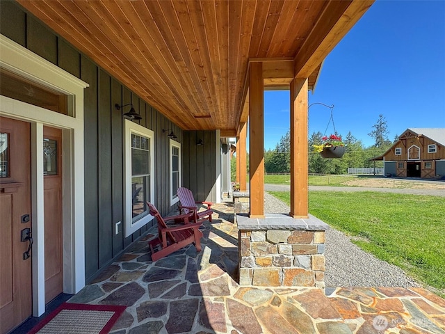 921 Chicken Coop Rd, Sequim, WA 98382 - view of patio / terrace with covered porch