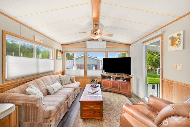 316 W Lake Samish Dr, Bellingham, WA 98229 - living room with light wood-style flooring, healthy amount of natural light, wainscoting, a ceiling fan, and wood walls