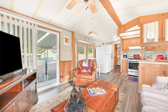 316 W Lake Samish Dr, Bellingham, WA 98229 - living area with ceiling fan, light wood finished floors, wainscoting, wood walls, and vaulted ceiling
