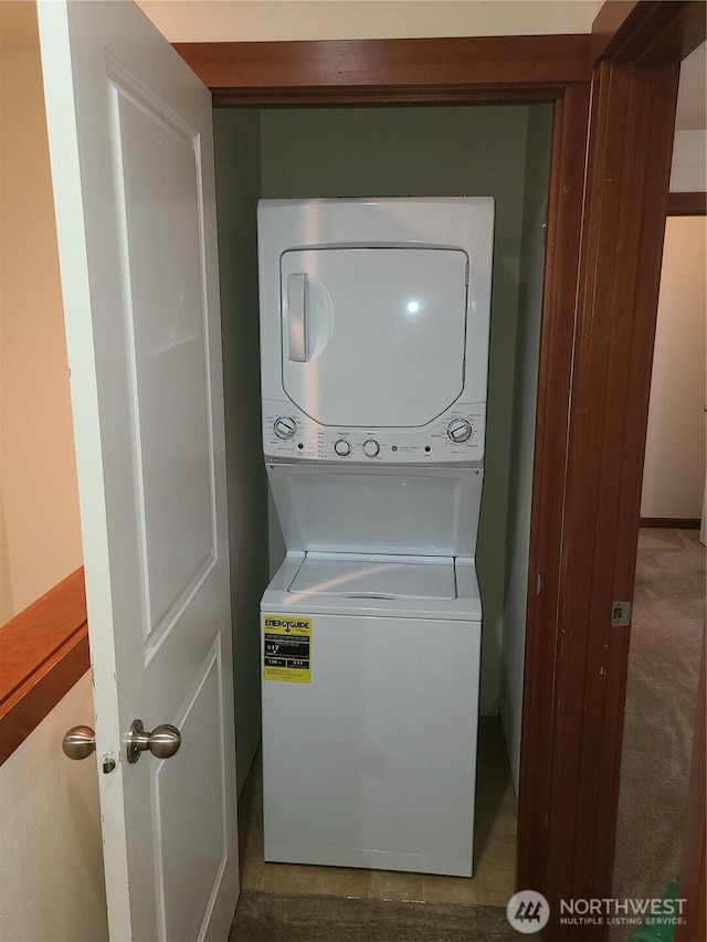 501 N 105th St Unit A, Seattle, WA 98133 - clothes washing area with stacked washer / dryer