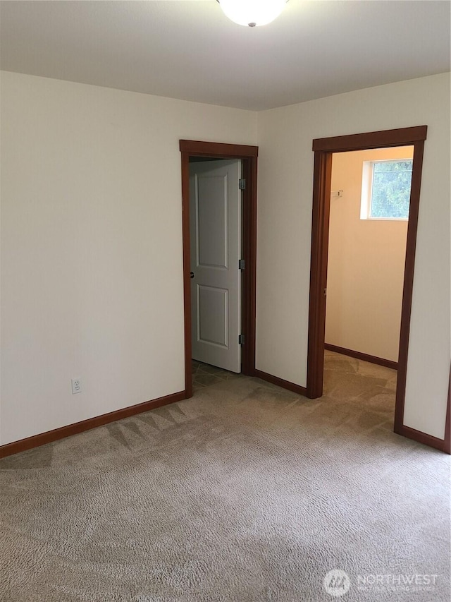 501 N 105th St Unit A, Seattle, WA 98133 - empty room with light colored carpet and baseboards