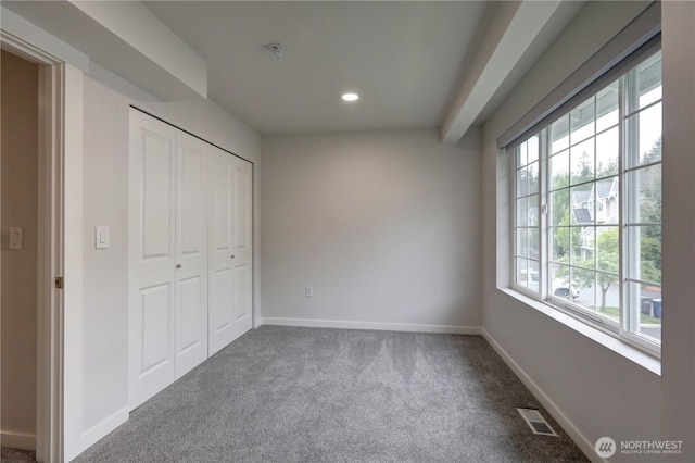 23120 SE Black Nugget Rd Unit A2, Issaquah, WA 98029 - unfurnished bedroom with dark colored carpet, recessed lighting, baseboards, and a closet