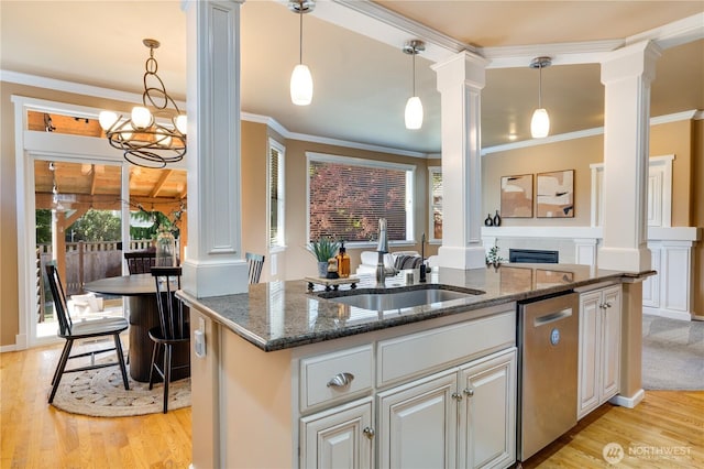 3212 Maplewood Cir NE, Tacoma, WA 98422 - kitchen featuring ornate columns, stainless steel dishwasher, light wood-style floors, a chandelier, and ornamental molding