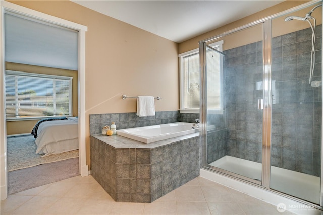 3212 Maplewood Cir NE, Tacoma, WA 98422 - bathroom featuring tile patterned flooring, a bath, a shower stall, and ensuite bathroom