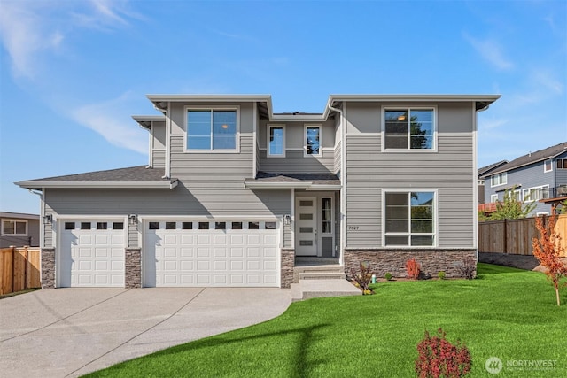 7627 10th St SE, Lake Stevens, WA 98258 - prairie-style home featuring stone siding, concrete driveway, a garage, and an attached garage