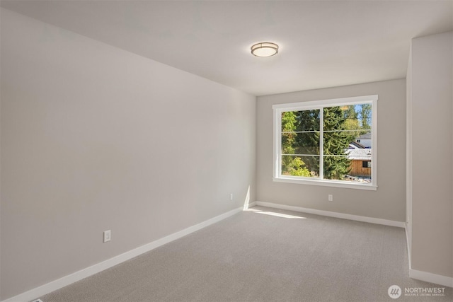 7627 10th St SE, Lake Stevens, WA 98258 - carpeted spare room with baseboards