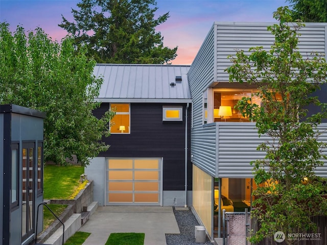 view of front of property featuring a standing seam roof and metal roof
