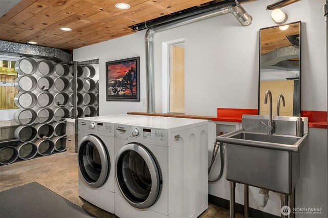laundry area with recessed lighting, separate washer and dryer, and wooden ceiling