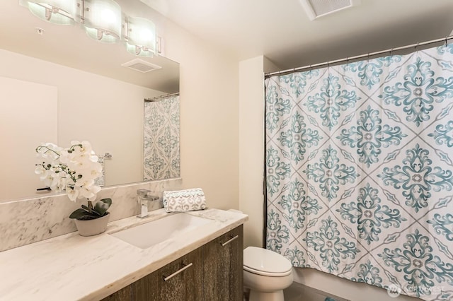 2911 2nd Ave Unit 513, Seattle, WA 98121 - bathroom with toilet and vanity