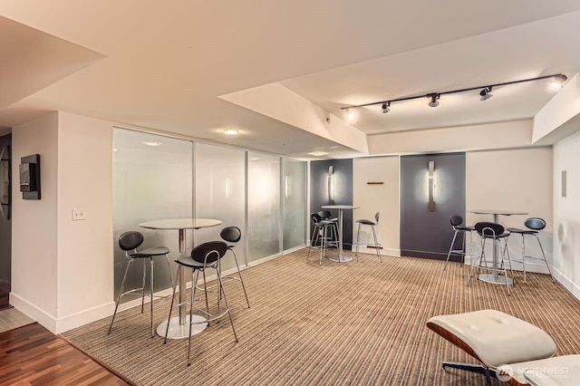 2911 2nd Ave Unit 513, Seattle, WA 98121 - interior space featuring baseboards and track lighting
