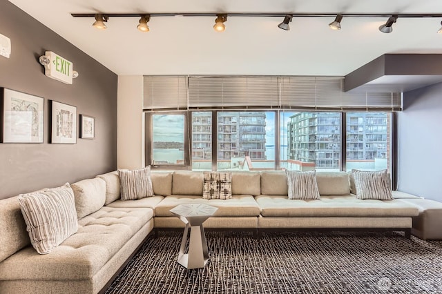 2911 2nd Ave Unit 513, Seattle, WA 98121 - living room with rail lighting