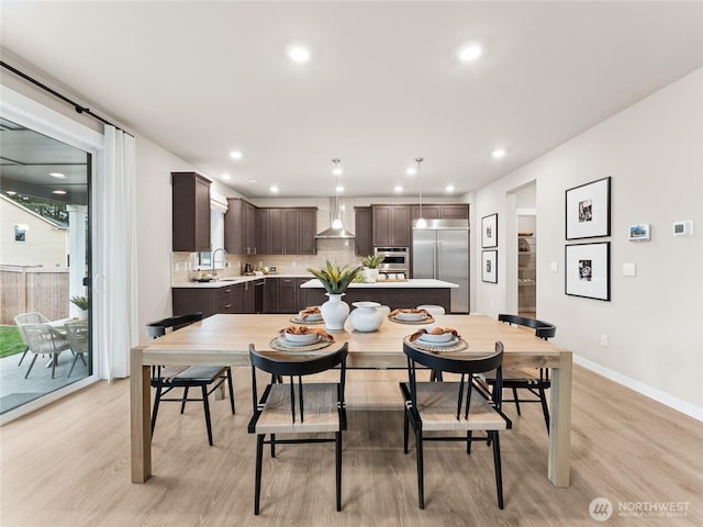 11455 SE 84th St Unit 43, Newcastle, WA 98056 - dining area with light wood-type flooring, baseboards, and recessed lighting