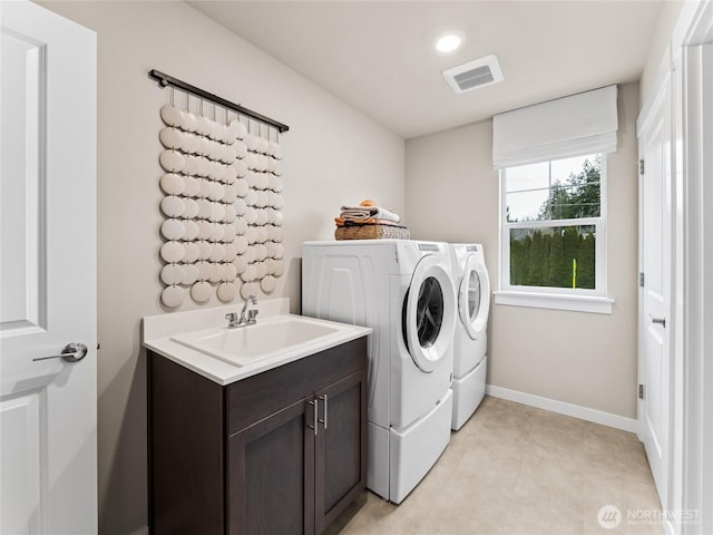 11455 SE 84th St Unit 43, Newcastle, WA 98056 - laundry room featuring separate washer and dryer, cabinet space, light carpet, baseboards, and recessed lighting