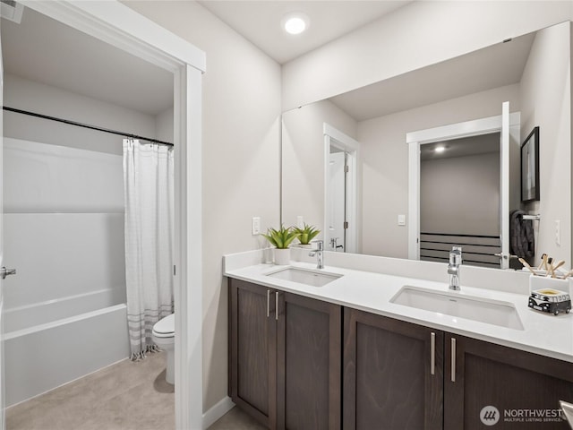 11455 SE 84th St Unit 43, Newcastle, WA 98056 - full bathroom featuring toilet, double vanity, and shower / tub combo with curtain