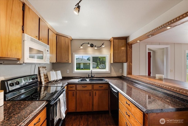 3270 Pine St, Longview, WA 98632 - kitchen with black appliances and brown cabinetry
