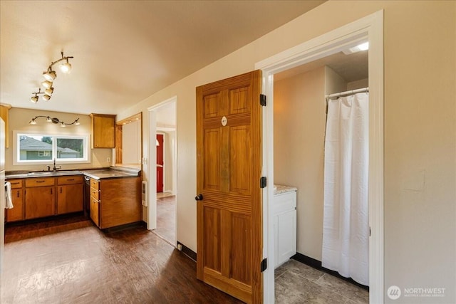 3270 Pine St, Longview, WA 98632 - kitchen featuring brown cabinets and track lighting
