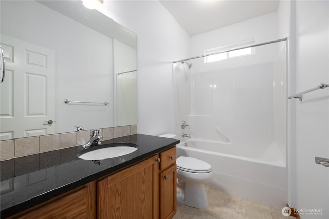 997 Chestnut Loop, Mount Vernon, WA 98273 - bathroom featuring toilet, tub / shower combination, vanity, and tile patterned flooring