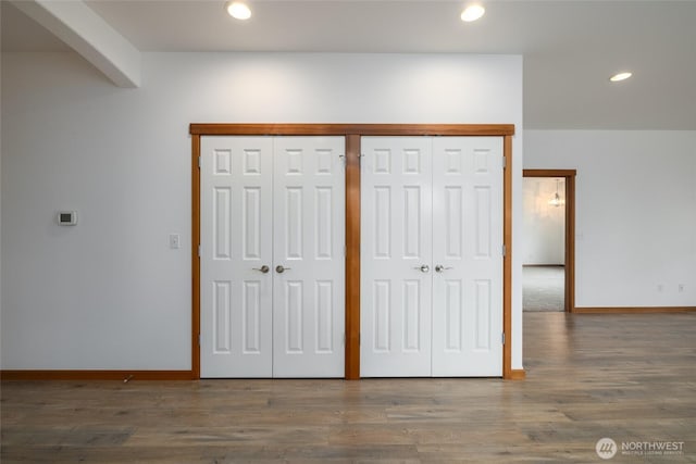 997 Chestnut Loop, Mount Vernon, WA 98273 - unfurnished bedroom featuring multiple closets, baseboards, recessed lighting, and wood finished floors